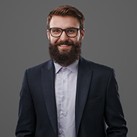 cheerful-bearded-man-in-glasses-8SR89EE